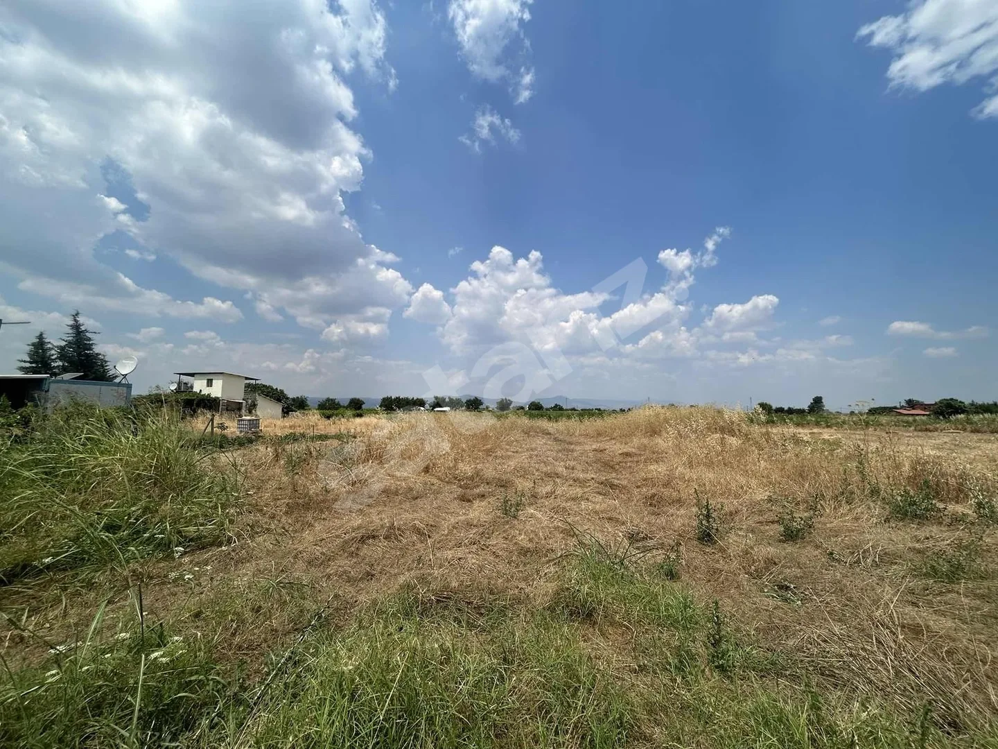 Güzelköy'de Satılık 7268m2 Arazi - Su - Yol var. 4.725.000₺